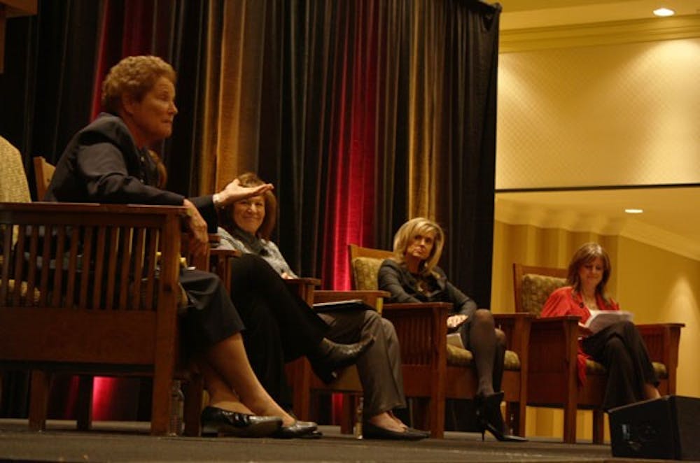 Vice Principal and Athletics Director of Xavier College Preparatory in Phoenix Sister Lynn Winsor, answers a question from azcentral Sports Columnist , Paola Boivin, while part of a five-women panel consisting of (left to right), unseen, author and athlete Lyn St. James, President and CEO of the Plaza Companies Sharon Harper and ASU women's basketball head coach Charli Turner Thorne. The panel of women were celebrating 40 years of Title IX on Wednesday afternoon. (Photo by Jessie Wardarski)