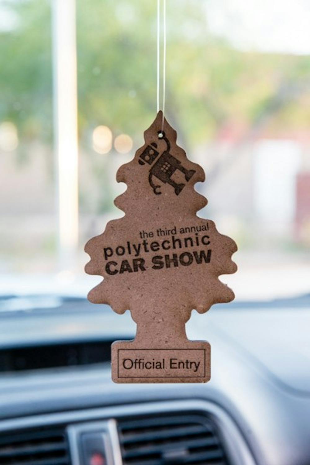 Entrants of the 3rd Annual Polytechnic Car Show received a custom air freshener as a gift. (Photo by Andrew Ybanez)