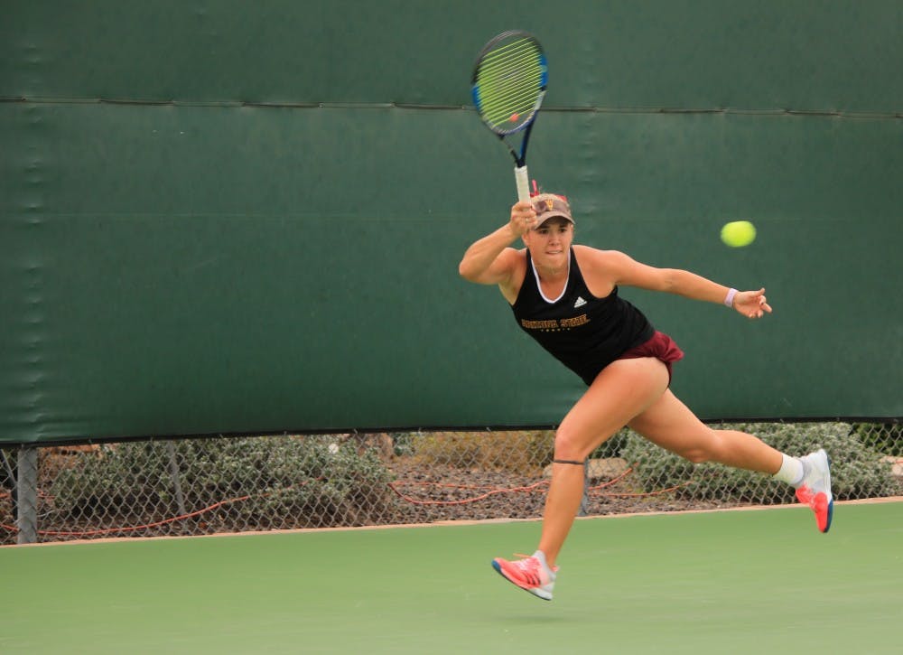 ASU senior tennis player Kassidy Jump competes in a singles match against Ohio state Whiteman Tennis Center in Tempe, Arizona on Sunday, March 3, 2017.
