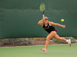 ASU senior tennis player Kassidy Jump competes in a singles match against Ohio state Whiteman Tennis Center in Tempe, Arizona on Sunday, March 3, 2017.