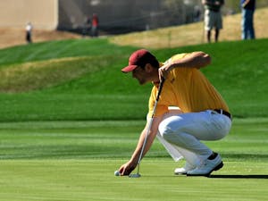 Junior Jon Rahm sets his ball on the green at the 9th hole of the 2015 Waste Management Phoenix Open on Feb. 1, 2015.