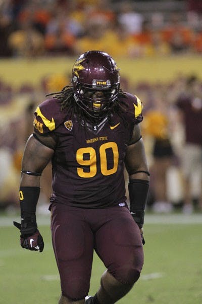 Redshirt junior defensive tackle Will Sutton cheers after a play during the Sun Devils’ 45-14 win over Illinois on Sept. 8.  (Photo by Sam Rosenbaum)