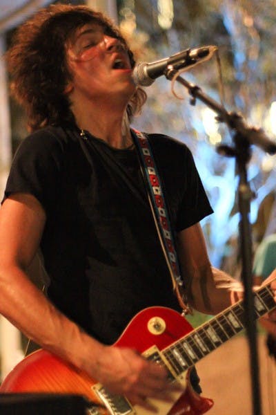 LATE NIGHT JAM: The Jake Allen Band performs in front of the Memorial Union on the Tempe campus Monday night. (Photo by Lisa Bartoli)