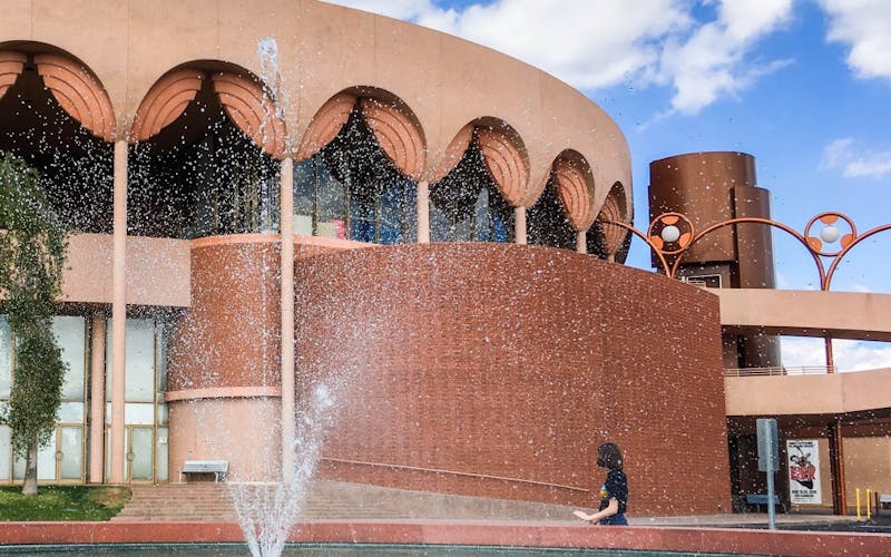A student looks up at Gammage Auditorium in Tempe, Arizona, on Sunday, March 11, 2018.