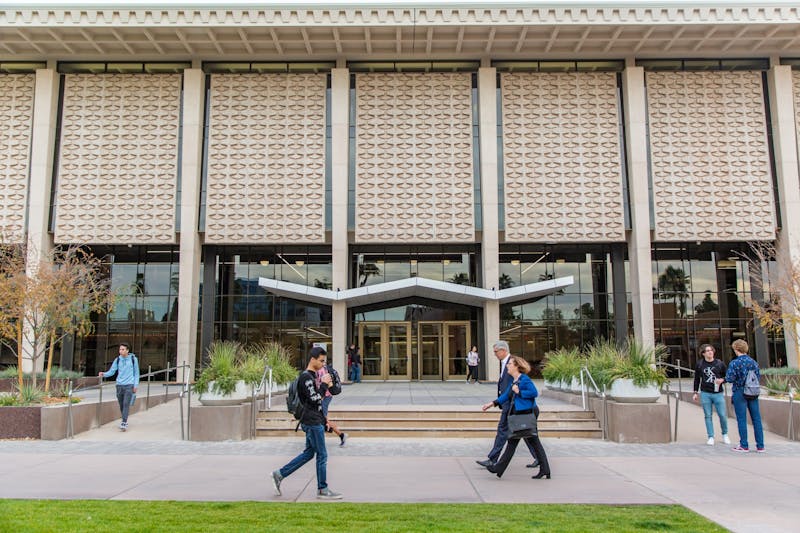 ASU students walk past the newly redesigned Hayden Library on the Tempe campus on Thursday, Jan. 16, 2020.&nbsp;