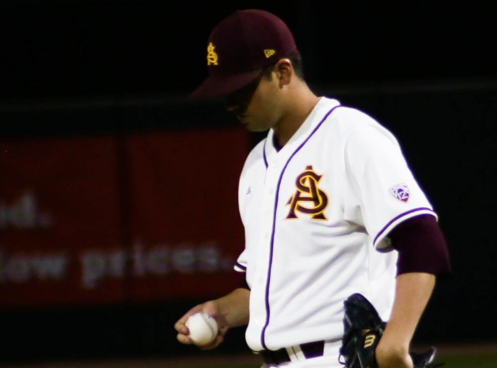 Junior Seth Martinez (#8) prepares to pitch the ball on Friday, March 3, 2016, at Phoenix Municipal Stadium during the gamea gainst Eastern Michigan University.