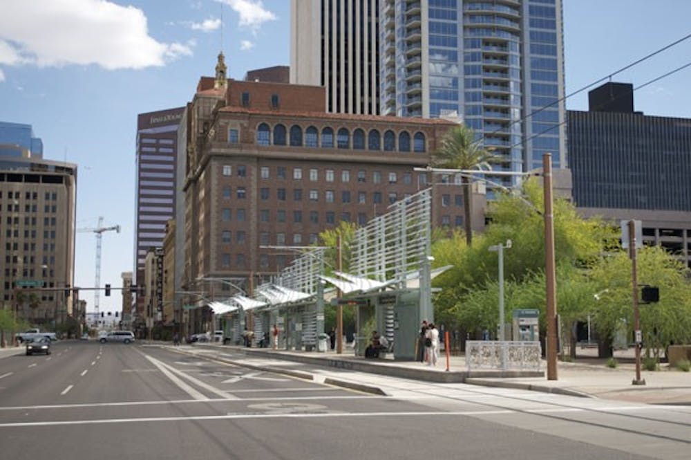 GREEN LIGHT RAILS: Energize Phoenix, which is a partnership between ASU and the city of Phoenix, are helping to make the light rail "greener". (Photo by Molly Smith)
