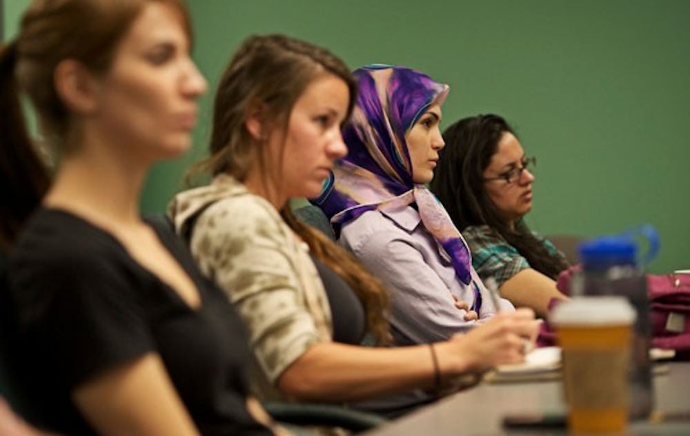 SOLAR LECTURE: Students listen to Ernesto Fonseca's presentation on solar design applications in architectural design. Fonseca’s applications have been implemented from Phoenix to Guadalupe, Mexico. (Photo by Michael Arellano)