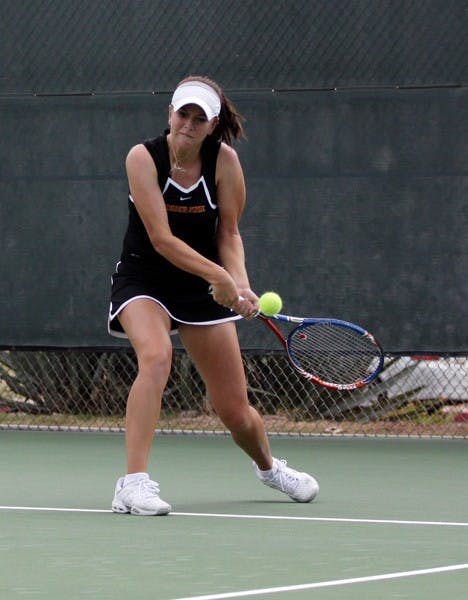 Joanna Smith hits a backhand during the ASU Thunderbird Invitational on Nov. 4, 2011. Smith was one of many Sun Devils to win matches over UC Davis and UC Santa Barbara last weekend. (Photo by Nathan Meacham)