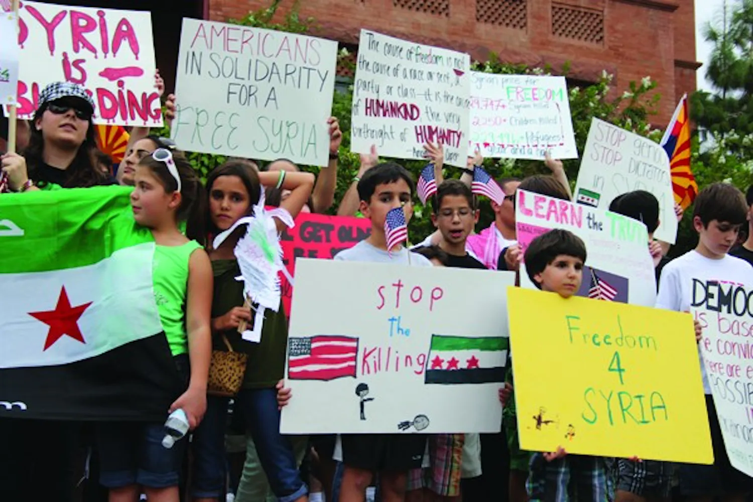 Advocates for Syrian peace and freedom marched in Tempe Sept. 9, 2012. Syrian President Bashar al-Assad's attacks on his own people began two years ago and today the casualties have risen to more than 100,000. (Photo by Ana Ramirez)