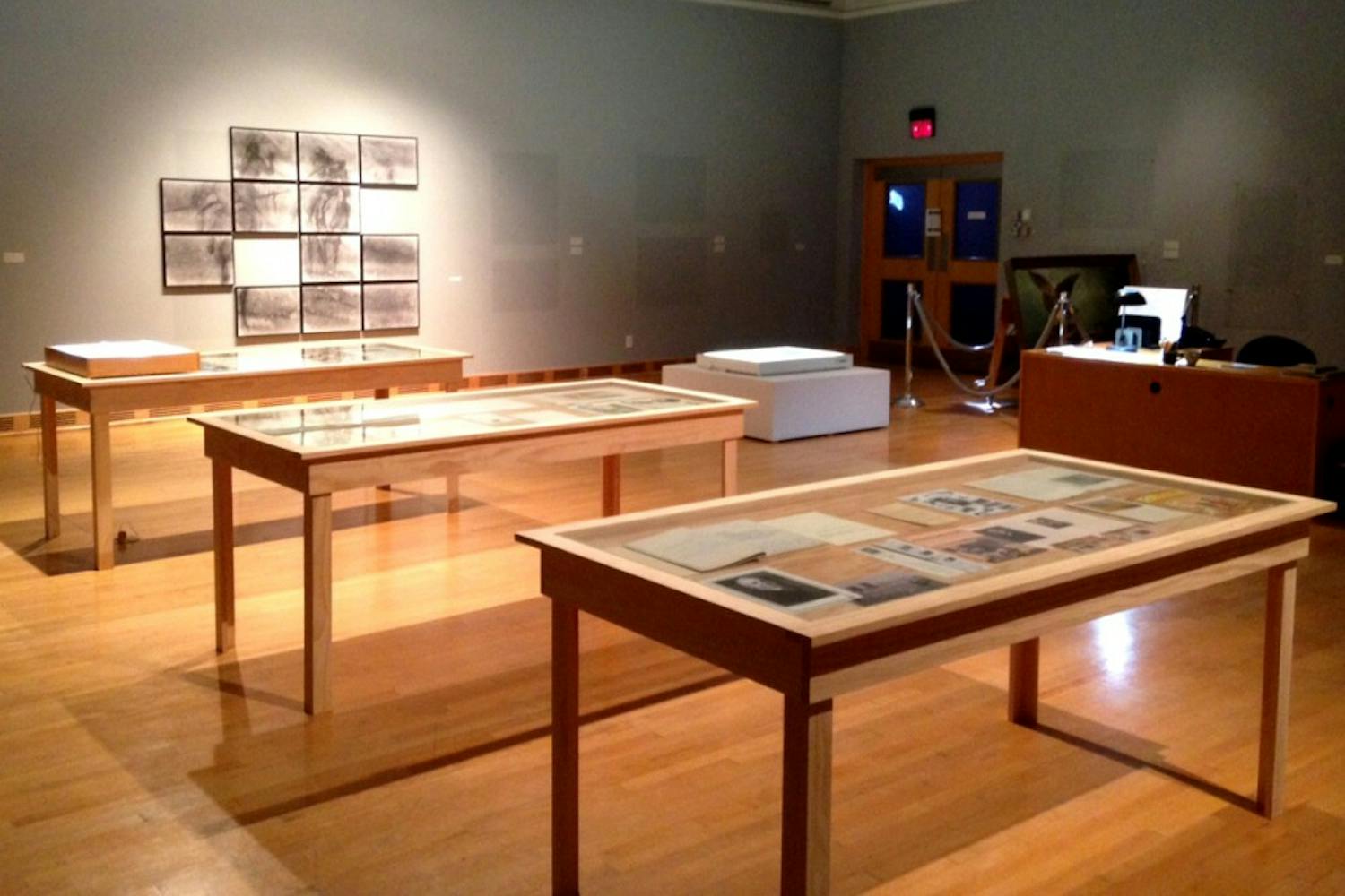 Tables display various stages of the scientific and historical testing processes used to determine a painting's authenticity at the Superfake/The Parley exhibition at the ASU Art Museum on Saturday, Jan. 9, 2016. 