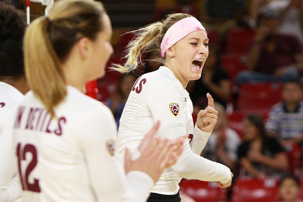 Junior outside hitter Kizzy Ricedorff reacts after winning a point in the first set against University of Nevada, Las Vegas during the Red Lion Invitational Friday, Sept. 18, 2015 at Wells Fargo Arena in Tempe. The Sun Devils defeated the Rebels 3 games to none (25-10, 25-21, 25-15).