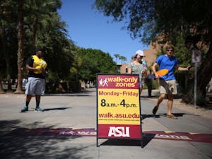 Passing students respecting the walk-only zones on Saturday, Sep. 16, 2016, on the ASU campus in Tempe, Arizona.