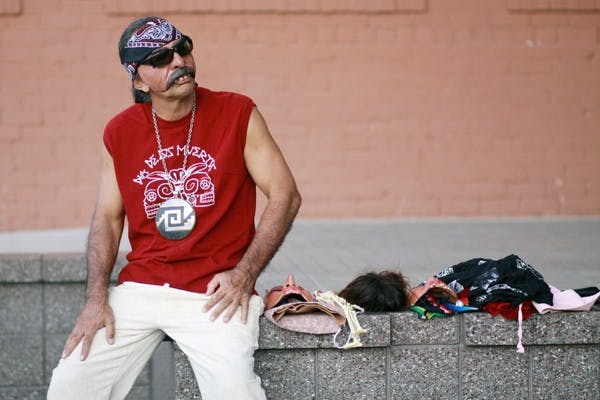 MASK MAKER: The Zarco Guerrero Family Chicano Musical Group performed at the Downtown Civic Space Park Thursday evening as one of many events this week hosted by Project Humanities. (Photo by Lillian Reid)