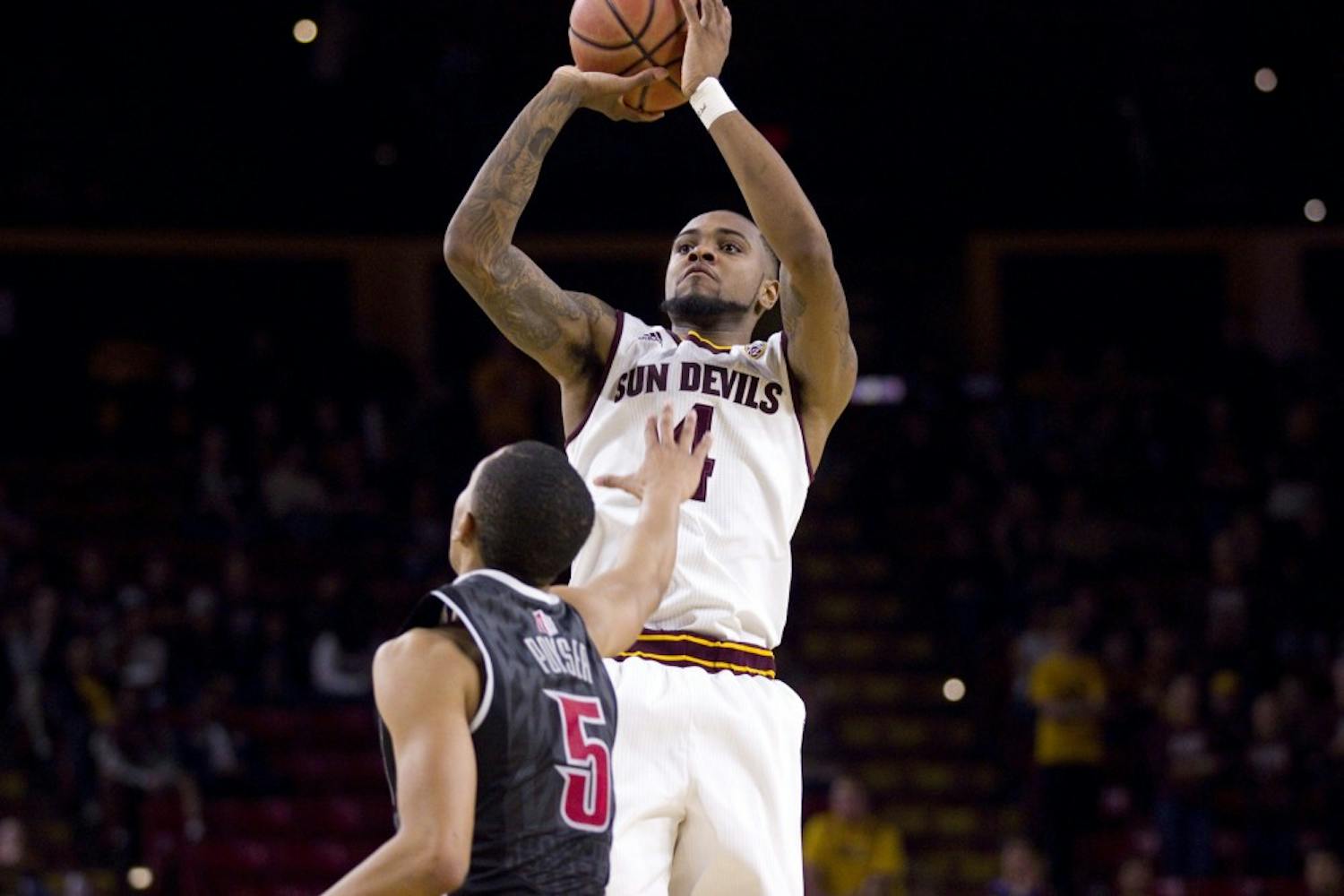 ASU senior guard Torian Graham (4) shoots a three-pointer in the second half of a men's basketball game against the UNLV Runnin' Rebels in Wells Fargo Arena in Tempe, Arizona on Saturday, Dec. 3, 2016. ASU won 97-73, putting them at 5-3 on the season.