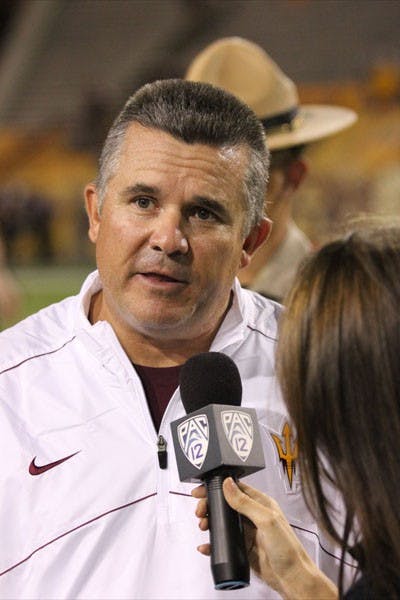 Coach Todd Graham speaks to a reporter following his first victory as ASU’s head coach against NAU 63-6 on Aug. 30. (Photo by Kyle Newman)