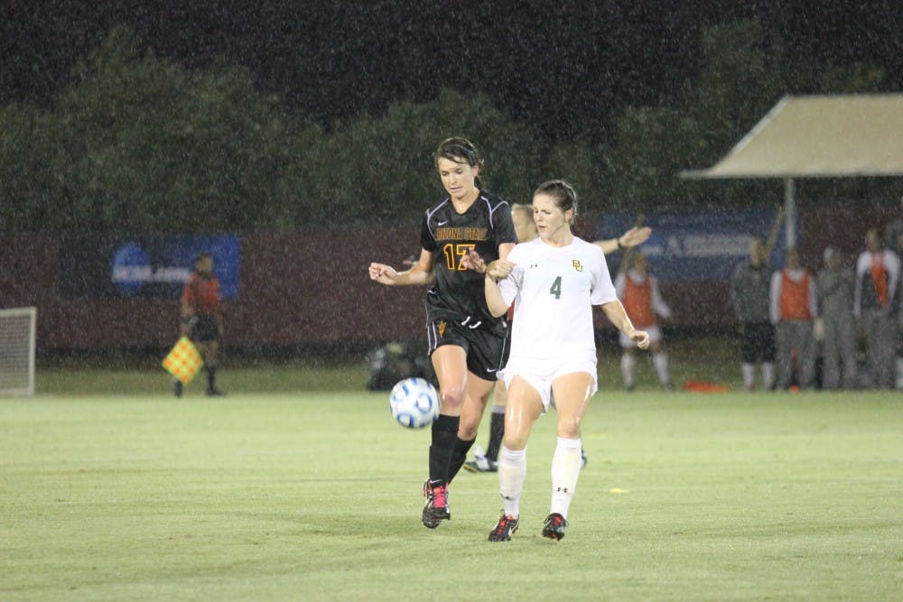 Sophomore forward Cali Farquharson battles for the ball at a home game in Tempe. 