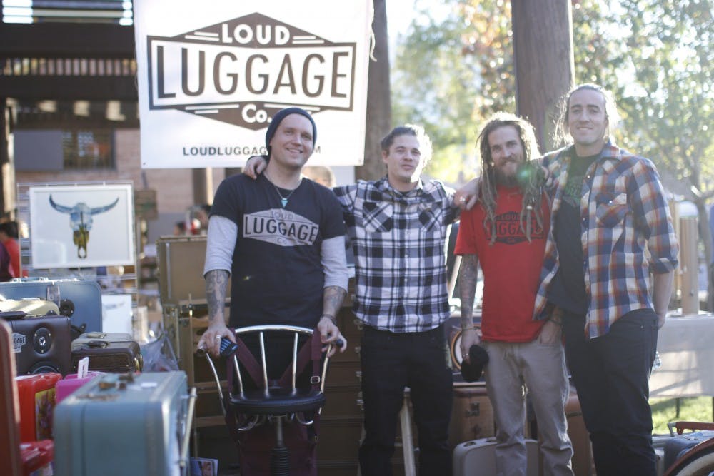 Jesse James Mckenzie, Maxwell Bitzer, Colton Compau, Brently Easten staff the Loud Luggage Booth at Phoenix Flea in downtown&nbsp;Phoenix on Nov. 28, 2015. Phoenix Flea, an outdoor market with about 70 vendors at this event, seeks to create local community with artisanal goods.