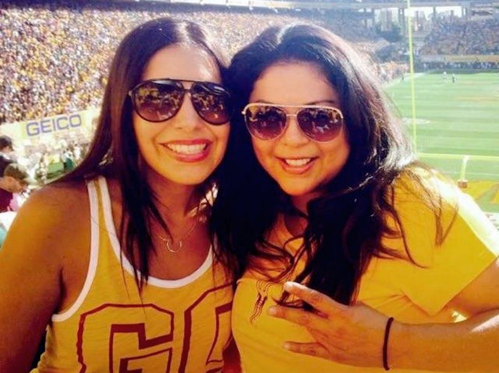 "Latina Still Standing" blogger&nbsp;Diana Bejarano (right) poses with a fellow Sun Devil sporting her ASU spirit.
