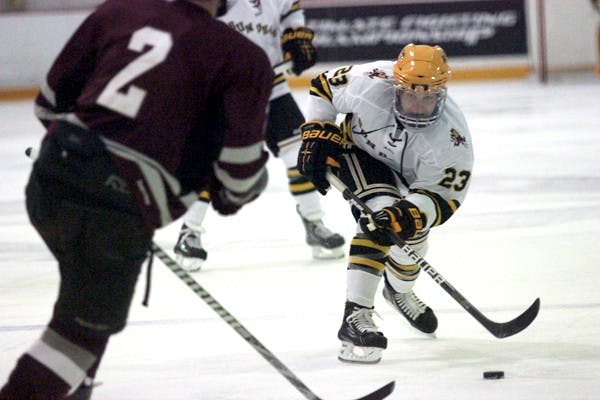 Jordan Young finishes off a wrist shot against Texas A&M on Sept. 20, 2012.  Coach Greg Powers talked about how Young needs to step up in the upcoming games. (Photo Courtesy of Kyle Newman)