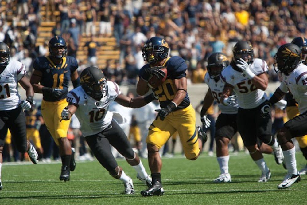 California senior tailback Isi Sofele (20) runs past the ASU defense during the Golden Bears’ 27-17 loss to the Sun Devils last Saturday. (Photo courtesy of Carli Baker/The Daily Californian)