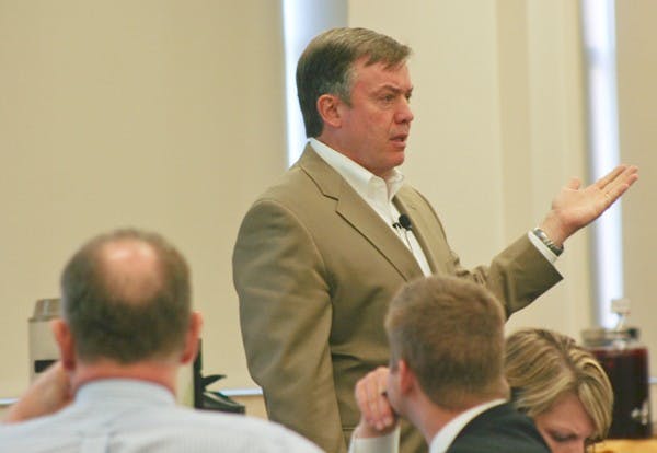 FULL AGENDA: ASU President Michael Crow speaks at the Arizona Board of Regents meeting on Tuesday about a wide range of issues including tuition costs, budget cuts and discontinued programs at the University. (Photo by Lisa Bartoli)