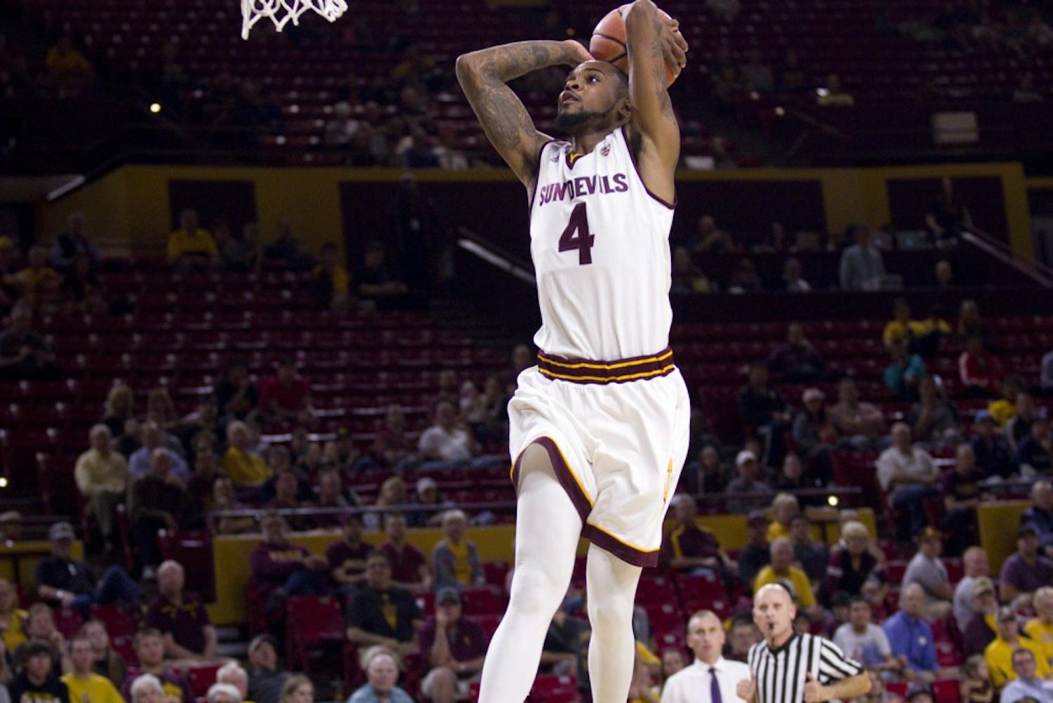 ASU senior guard Torian Graham (4) finishes a dunk in the second half of a 127-110 victory over the Citadel Bulldogs in Wells Fargo Arena in Tempe, Arizona on Wednesday, Nov. 23, 2016. Graham had 19 points in the victory.