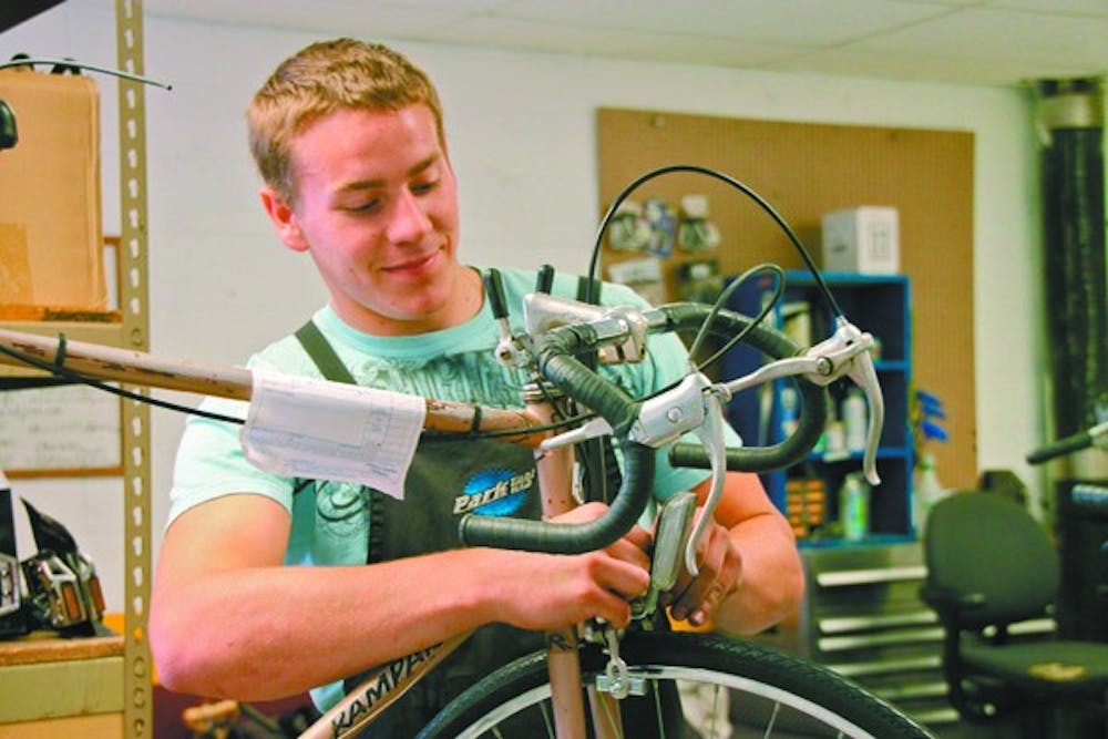 CO-OP: Managed by USG, the Bike Co-op has been a great service to many students this semester, repairing and tuning dozens of bikes each day. (Photo by Rosie Gochnour)
