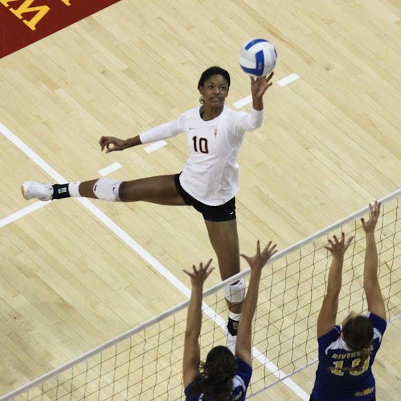 Senior Erica Wilson goes up for a spike during the ASU Sheraton Invitational on Friday, Sept. 14, 2012 at Wells Fargo Arena.