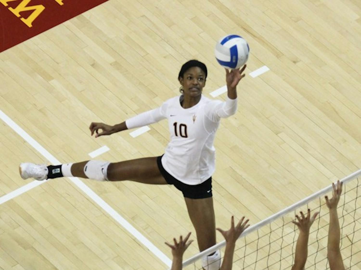 Senior Erica Wilson goes up for a spike during the ASU Sheraton Invitational on Friday, Sept. 14, 2012 at Wells Fargo Arena.