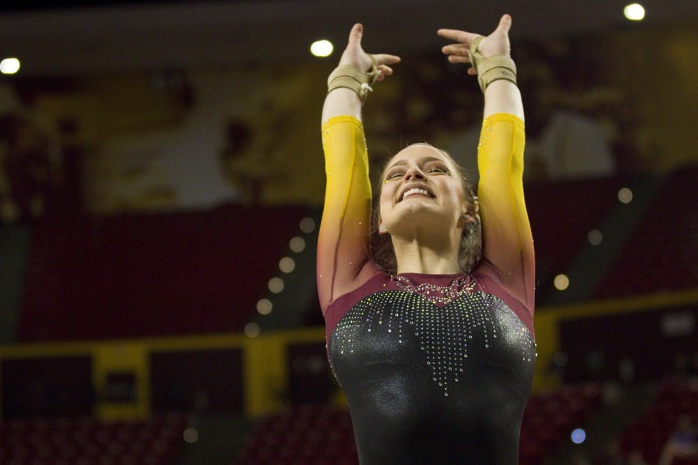ASU sophomore Justine Callis during her floor routine during a gymnastics meet against the no. 5 ranked Utah Utes in Wells Fargo Arena in Tempe, Arizona on Saturday, Feb. 25, 2017. ASU lost the meet 197.600 to 194.850. (Josh Orcutt/State Press)
