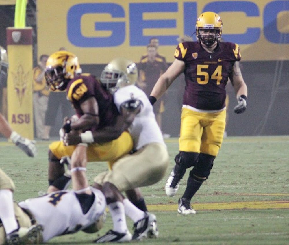 STEPPING UP: ASU redshirt freshman offensive lineman Tyler Sulka (54) follows a play during the Sun Devils’ win over UC Davis in September. With sophomore lineman Evan Finkenberg out due to injury, Sulka played against Utah on Saturday. (Photo by Beth Easterbrook)