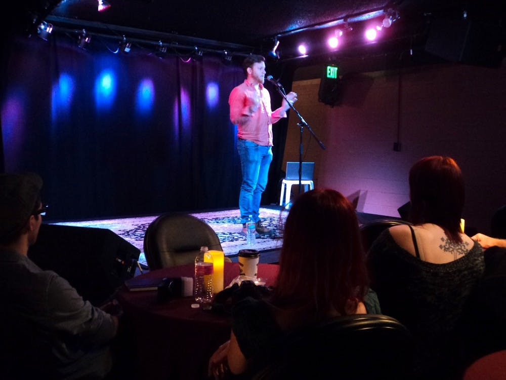 After the second round of the slam, feature poet Jeremiah Blue performed. Photo by Alexandria Conrad