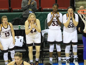 The ASU women's basketball bench celebrates a basket during its game against Utah in the first round of the Pac-12 Tournament on March 3 in Seattle. ASU won the game 72-54.