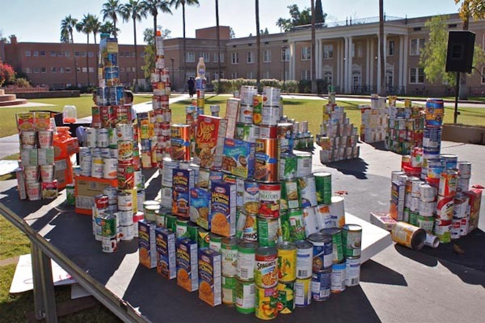 ASU student volunteers put together a food and clothing drive this week, collecting canned food and warm clothing for needy families in time for Thanksgiving. (Photo by Rosie Gochnour)