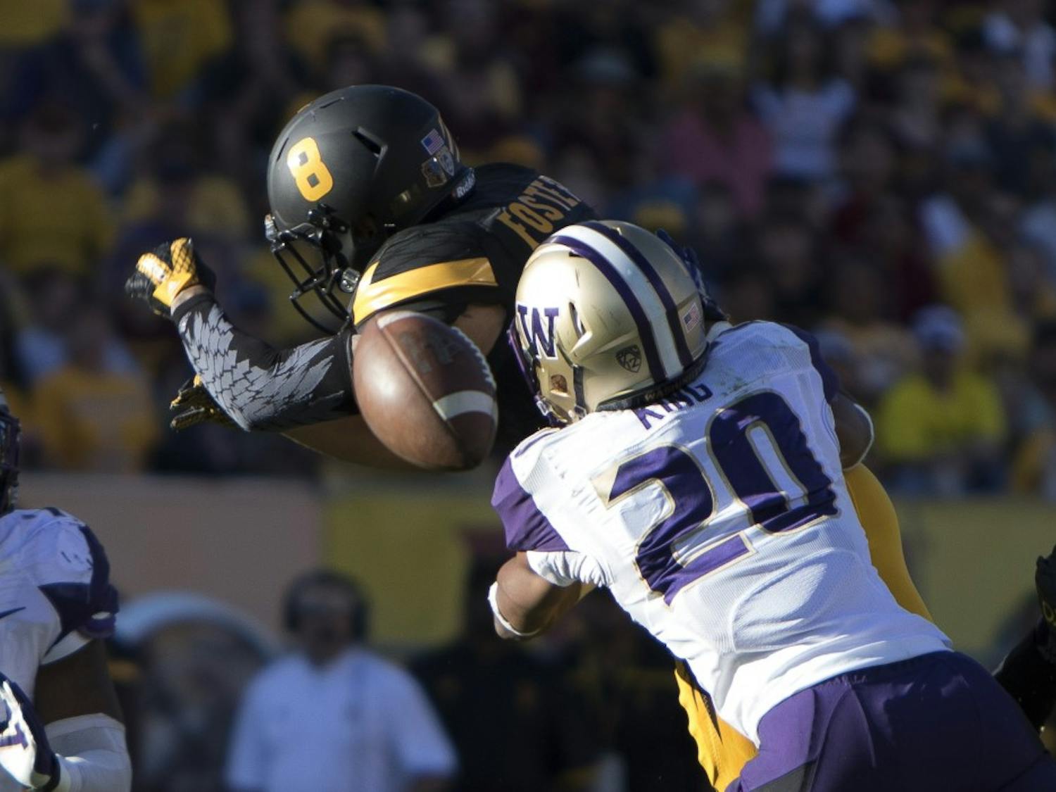 Senior wide receiver D.J. Foster (8) attempts to catch a pass in the fourth quarter against Washington on Saturday, Nov. 14, 2015, at Sun Devil Stadium in Tempe. The Sun Devils defeated the Huskies 27-17. 