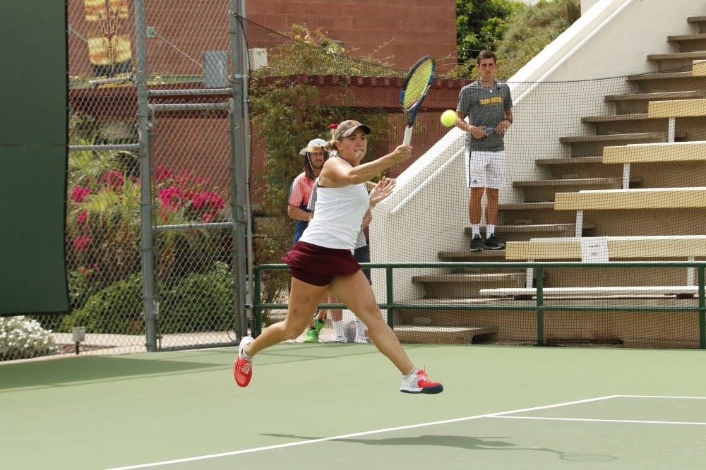 ASU senior Kassidy Jump competes in a singles match versus UNLA at the Whiteman Tennis Center in Tempe, Arizona on Wednesday, March 22, 2017. 