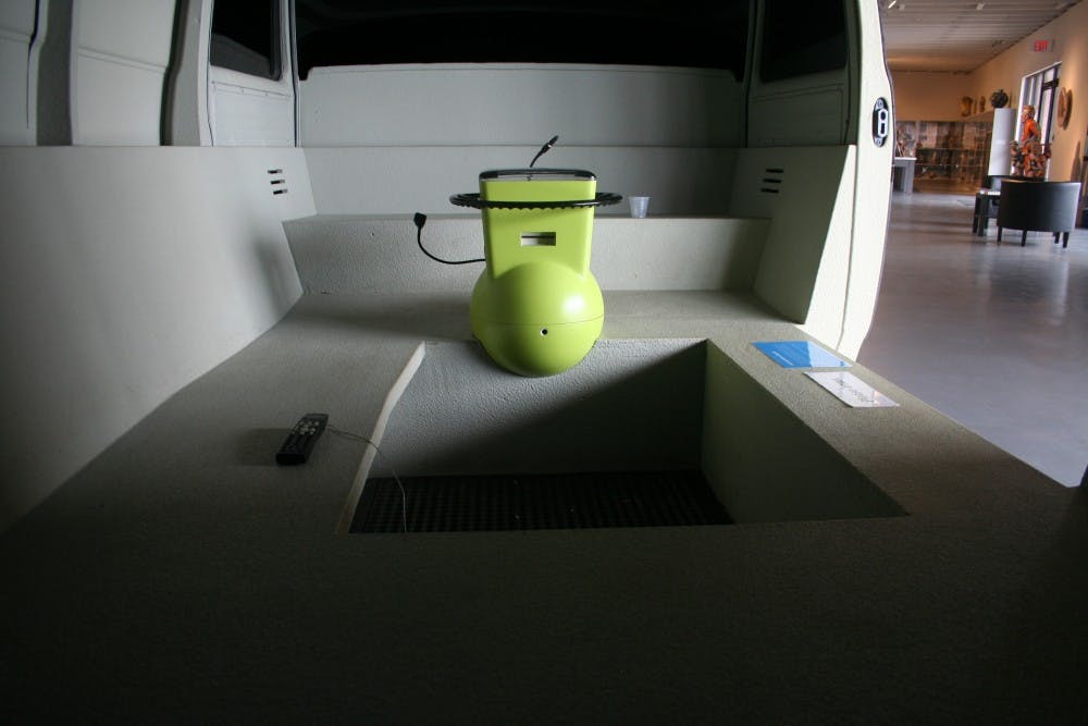 The neon green steering wheel waits patiently to decide what memories will transcend time.
Photo by Katie Mykleseth