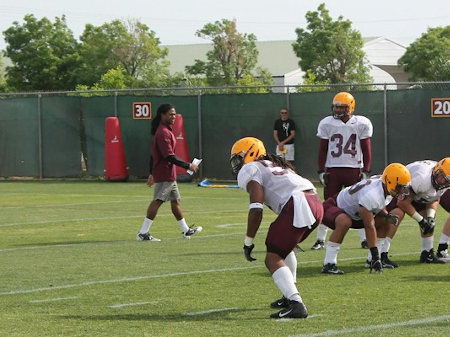 Redshirt senior linebacker Grandville Taylor watches for a snap during a special teams drill in practice on April 4. Taylor is hoping to work into the starting lineup for the Sun Devils in his last season. (Photo by Edmund J. Hubbard)
