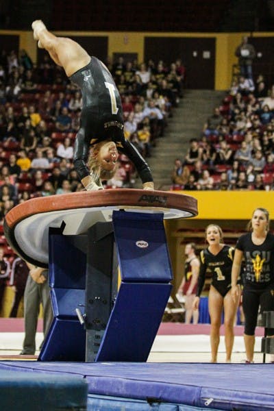 Freshman Carissa Kraus takes one final look at the vault before lifting off during a routine against Washington on Feb. 22.  Even as a freshman, Kraus was one of the most consistent Gym Devils on the vault and returns some stability to the event next season. (Photo Courtesy of Arianna Grainey)