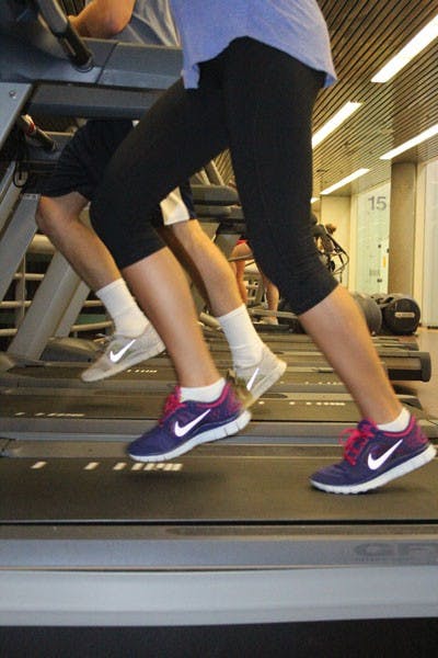 Students workout late at the Tempe campus SRC in attempt to stay fit for the upcoming year. The Freshman Challenge was launched by Well Devils to help freshman make a healthy transition into the college lifestyle. (Photo by Ana Ramirez)
