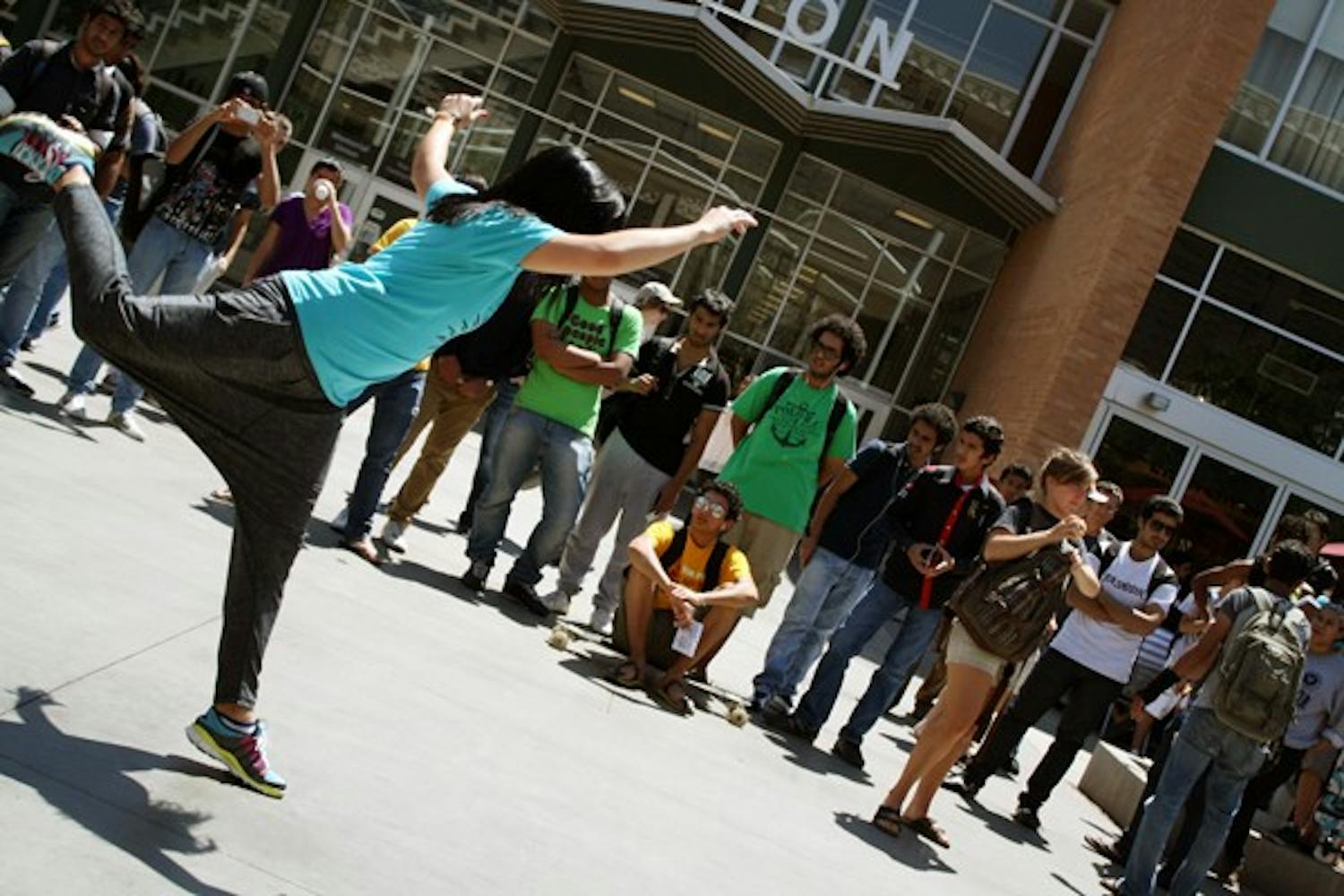 Students of the ASU dance program advertised for an event called Urban Soul, which incorporates the four elements of hip-hop, and will be held in downtown Phoenix on Saturday. (Photo by Jessie Wardarski)