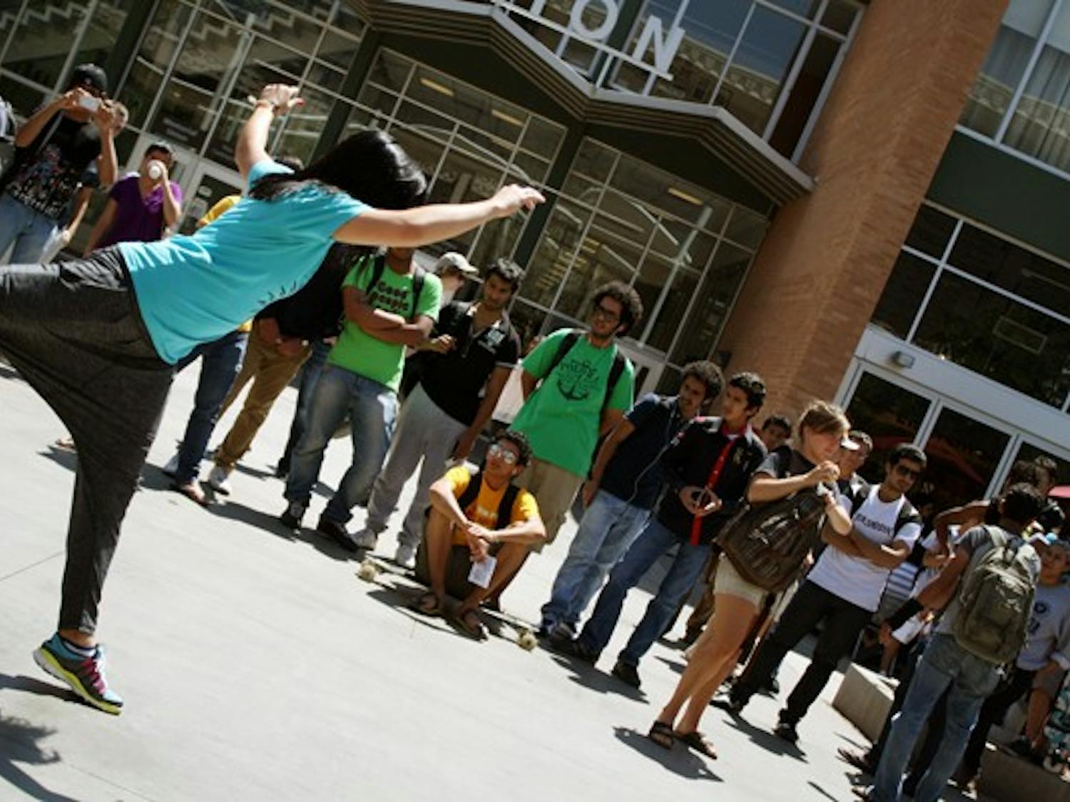Students of the ASU dance program advertised for an event called Urban Soul, which incorporates the four elements of hip-hop, and will be held in downtown Phoenix on Saturday. (Photo by Jessie Wardarski)