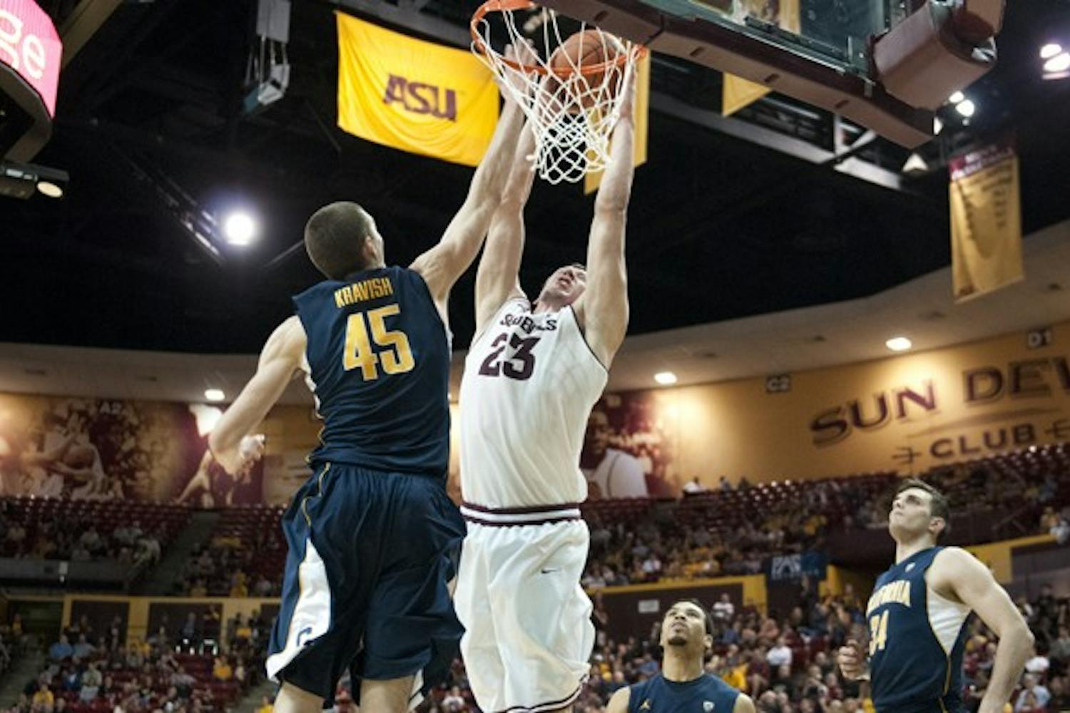 Senior center Ruslan Pateev throws down a dunk against Cal on Feb. 7. Pateev tied his career high with 12 points to help ASU beat Cal. (Photo by Molly J. Smith)