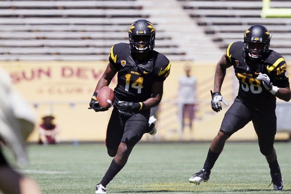 Joe Eason returns an interception in ASU’s spring football game. Eason had one of two interceptions on the day for the Sun Devils’ defense. (Photo by Sam Rosenbaum)