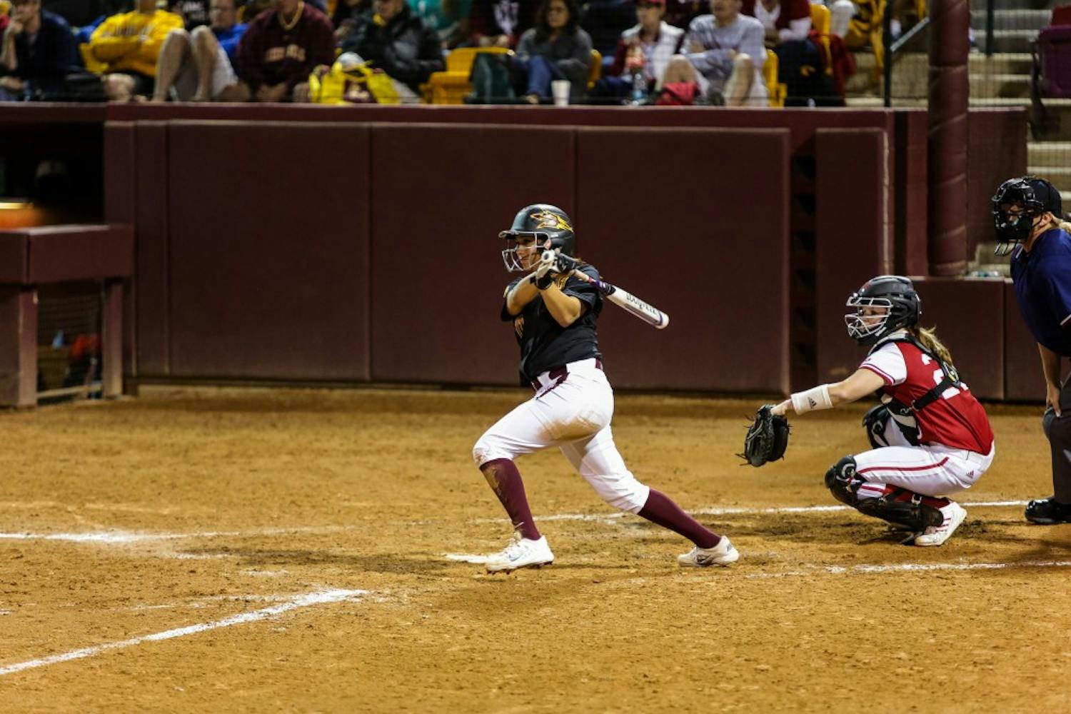 ASU sophomore shortstop Chelsea Gonzalez follows through after hitting a single vs. Indiana softball at Farrington Stadium on Feb. 7, 2015. Gonzalez’s hit would be part of a massive 6-run inning for the Sun Devils as they romped over the visiting Hoosiers 10-2. (Daniel Kwon/ The State Press)