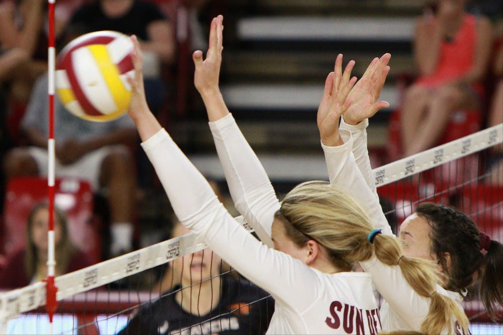 Junior outside hitter Cassidy Pickrell blocks the ball in the third set against Oregon State Sunday, Sept. 27, 2015 at Wells Fargo Arena in Tempe. The Sun Devils defeated the Beavers three games to none to improve to 13-0 on the season (25-18, 25-19, 25-20).