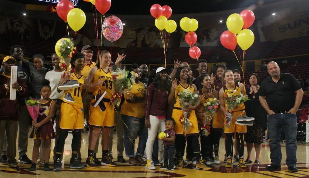 ASU women's basketball's senior class poses for pictures with family members&nbsp;after Senior Day on Sunday, Feb. 21, 2016, at Wells Fargo Arena in Tempe.