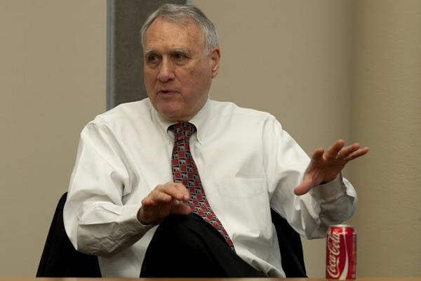 Republican Senator Jon Kyl informally meets with students and answers questions on Friday, Jan. 31 at the Barrett, the Honors College. The senators first topic addressed immigration. Kyl said he believes a compromise must occur in the house and suggests legalization opposed to full citizenship. (Photo by Mario Mendez)