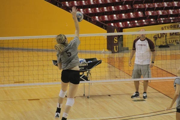 GET UP: Sophomore middle blocker Alexis Pinson goes up for a spike at a recent practice. The Sun Devils take on Seattle, San Diego State and Utah State in the ASU Sheraton Classic this weekend. (Photo by Andy Jeffreys)